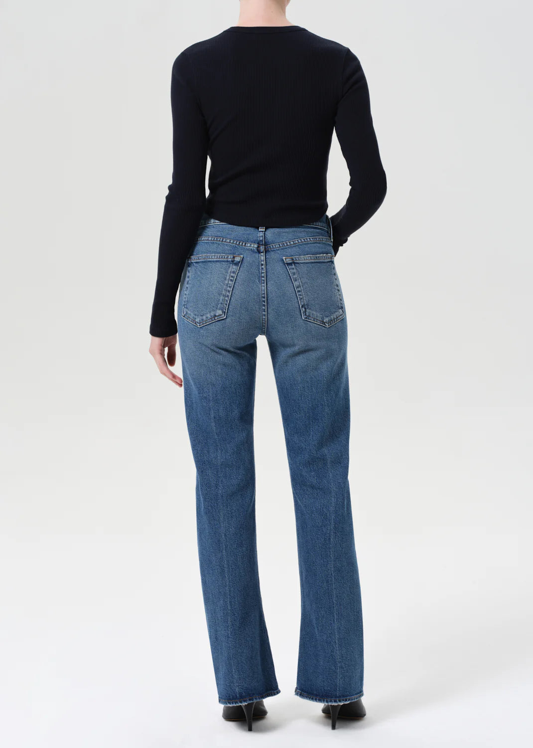 Back view of Agolde Kick Boot Jean in Curve showcasing the fit and subtle kick at the hem.