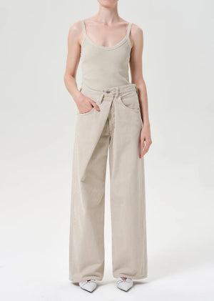 Detail of Agolde Vana Fold Corduroy in Rice Grass highlighting the 100% cotton composition.