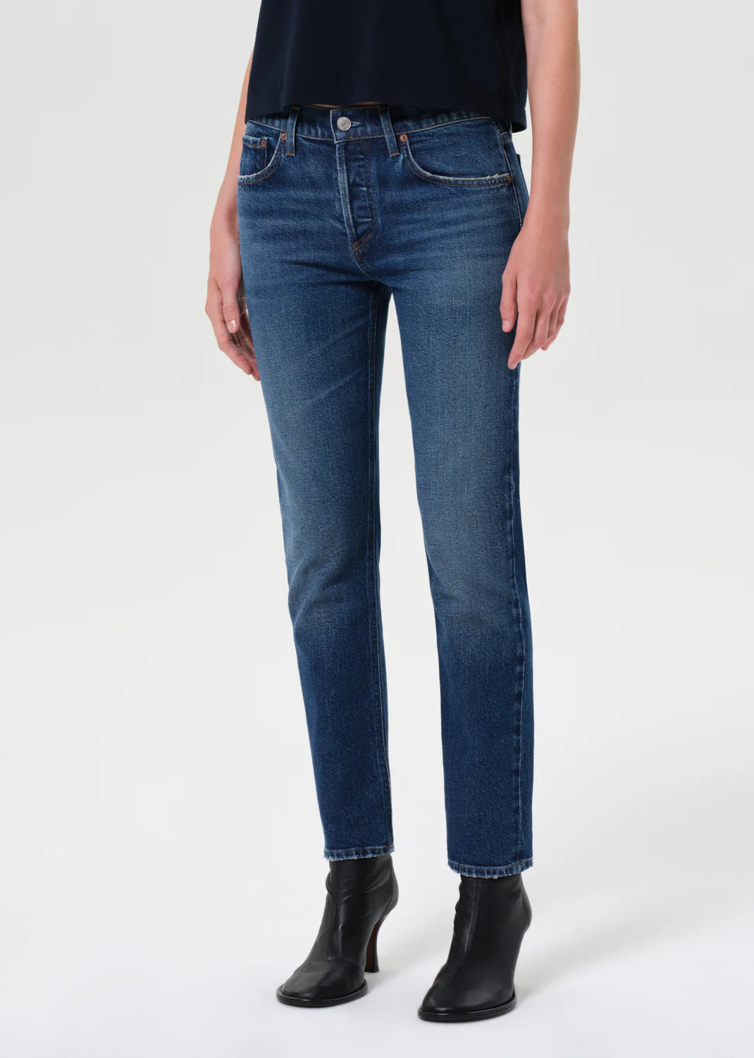 Close-up of the fading and marbling details on the Cocktail Ankle Jean in Outline.