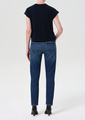 Model wearing the Cocktail Ankle Jean in Outline, styled with a fitted top for a modern look.