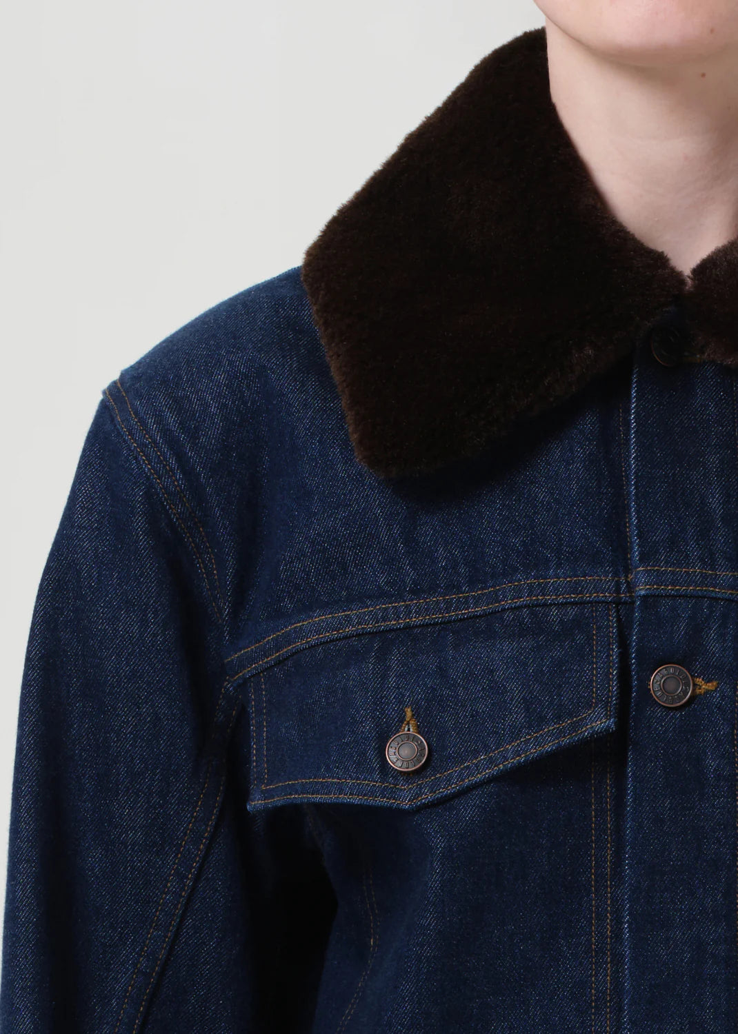 Model wearing Agolde Walker Jacket with Fur in Rinse, featuring a chic look perfect for any casual occasion.