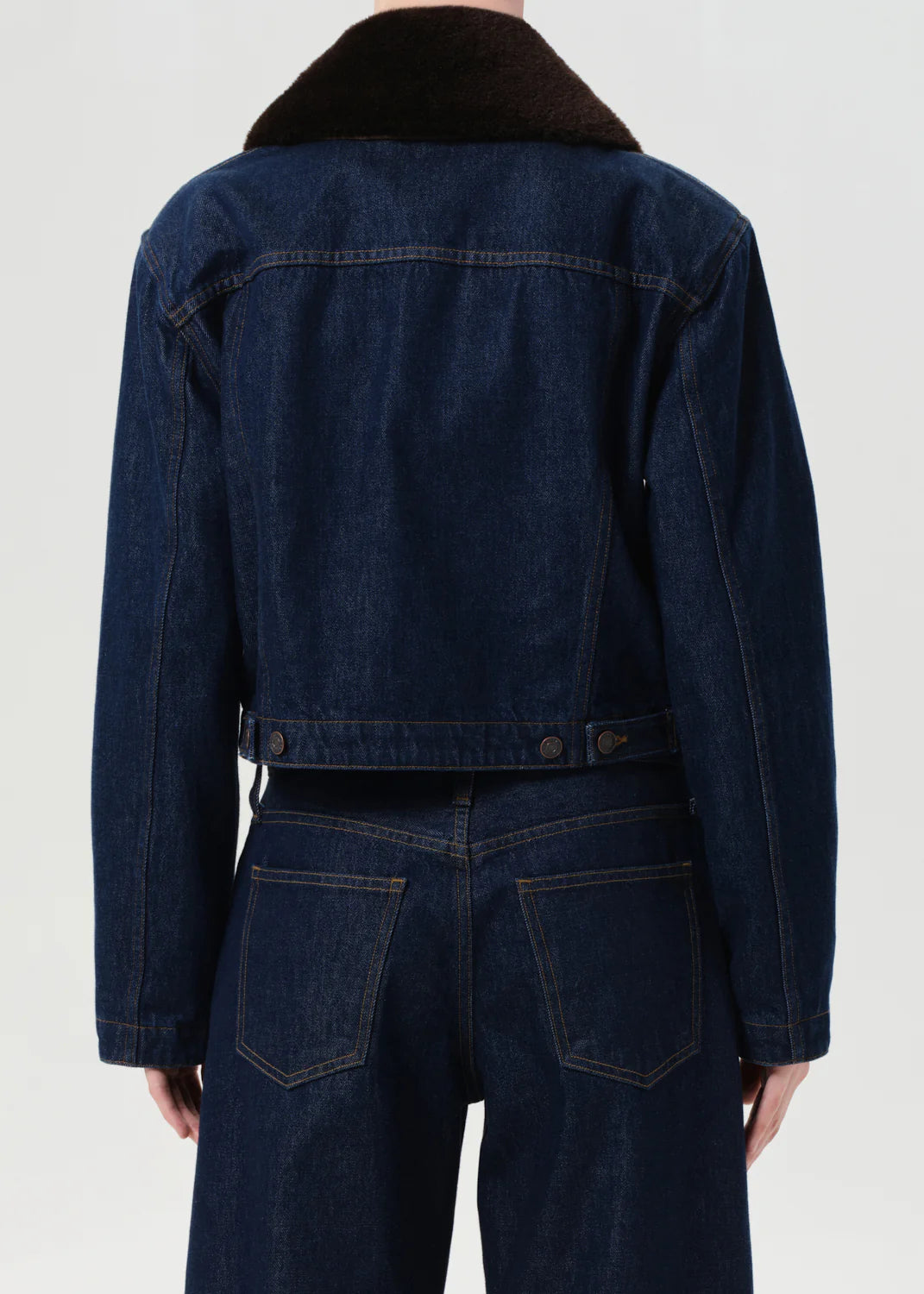Back view of the Agolde Walker Jacket with Fur in Rinse, showcasing its trendy cut and overall design.