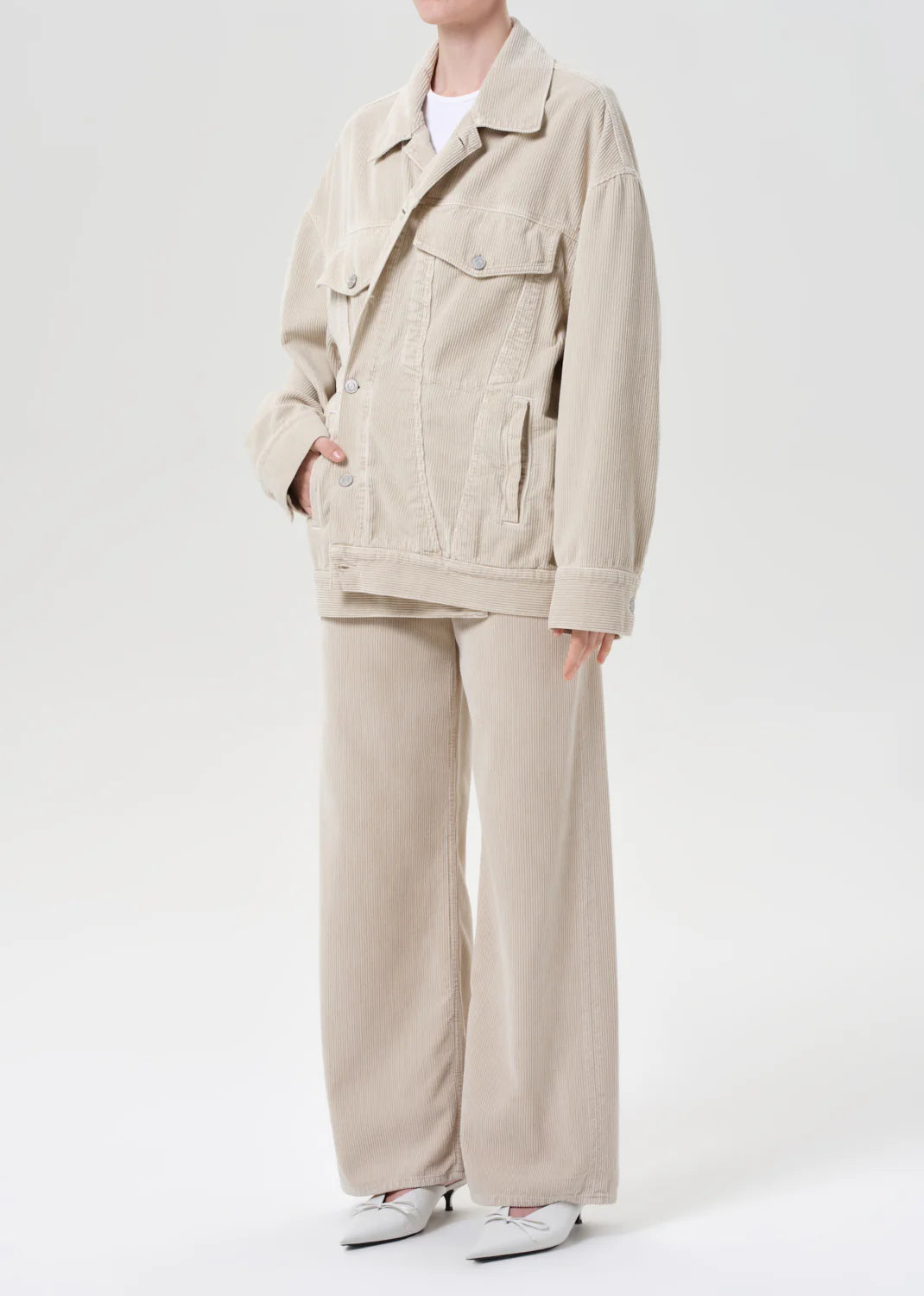 Close-up view of Agolde's Reworked Wayne Jacket in Rice Grass, highlighting its 100% cotton fabric and stylish oversized fit.