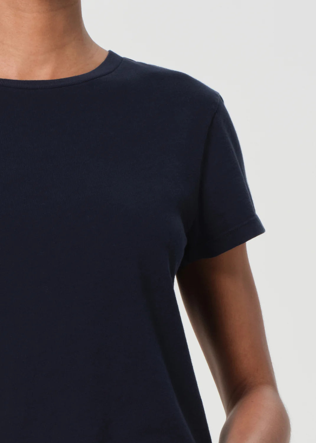 Adine Tee in Storm styled with low-rise jeans, ideal for a timeless look.