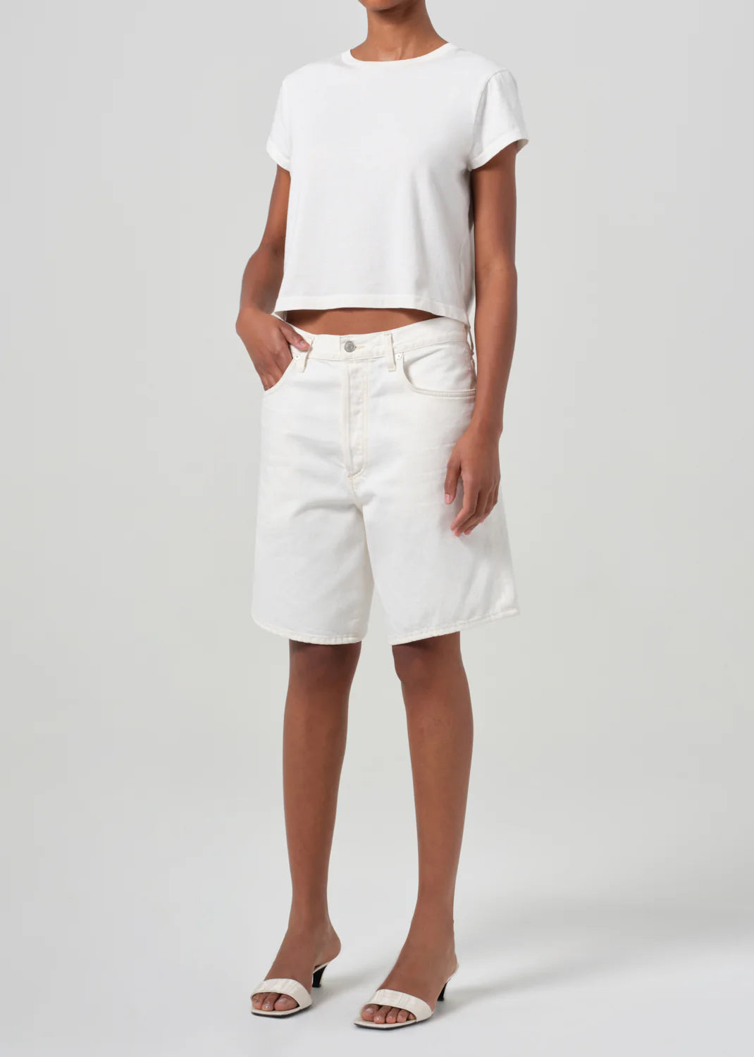 Close-up of Agolde's Adine Shrunken Tee in White Ash, highlighting the texture of the organic cotton.