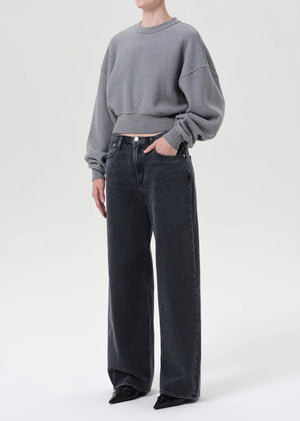 Close-up of the Kit Sweatshirt in Heather Grey, highlighting the breathable cotton fleece material.