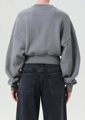 Back view of the Kit Sweatshirt in Heather Grey, featuring its cropped length and modern shape.