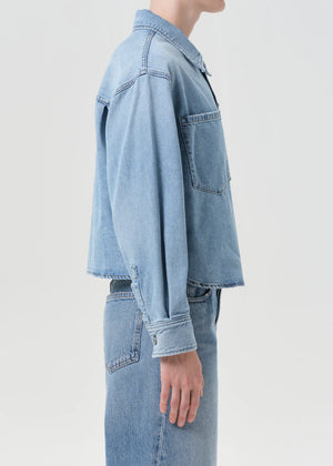 Back view of the Juna Shirt in Interval, featuring its relaxed fit and breathable denim material.