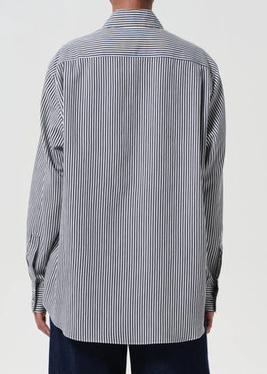 Flat lay of the Agolde Aris Shirt in Solene Stripe, showcasing its soft fabric and classic menswear design.