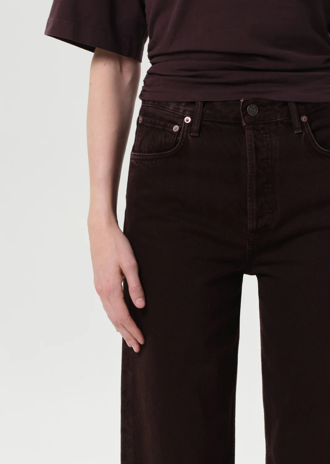 Flat lay of the Ren Jen in Sloe Berry styled with neutral tones, showcasing its versatility.