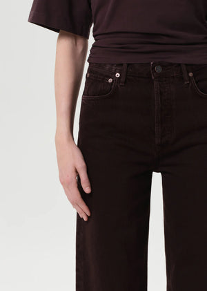 Flat lay of the Ren Jen in Sloe Berry styled with neutral tones, showcasing its versatility.
