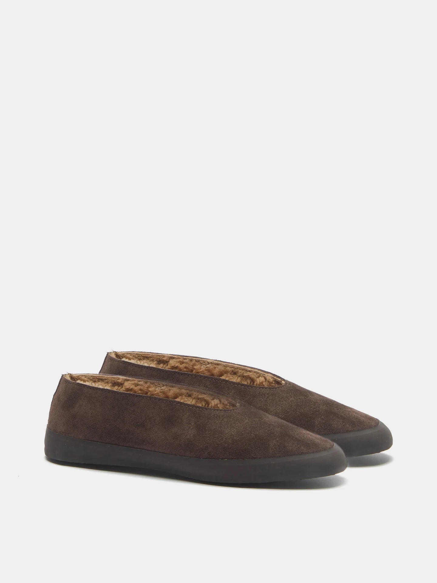 Stylish view of Apres Ski in Brown Shearling, highlighting its smooth rubber tread and luxurious design.