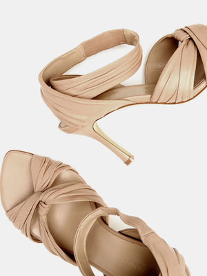 Antonia Pump in Fawn displayed elegantly to emphasize its Italian craftsmanship and chic design.