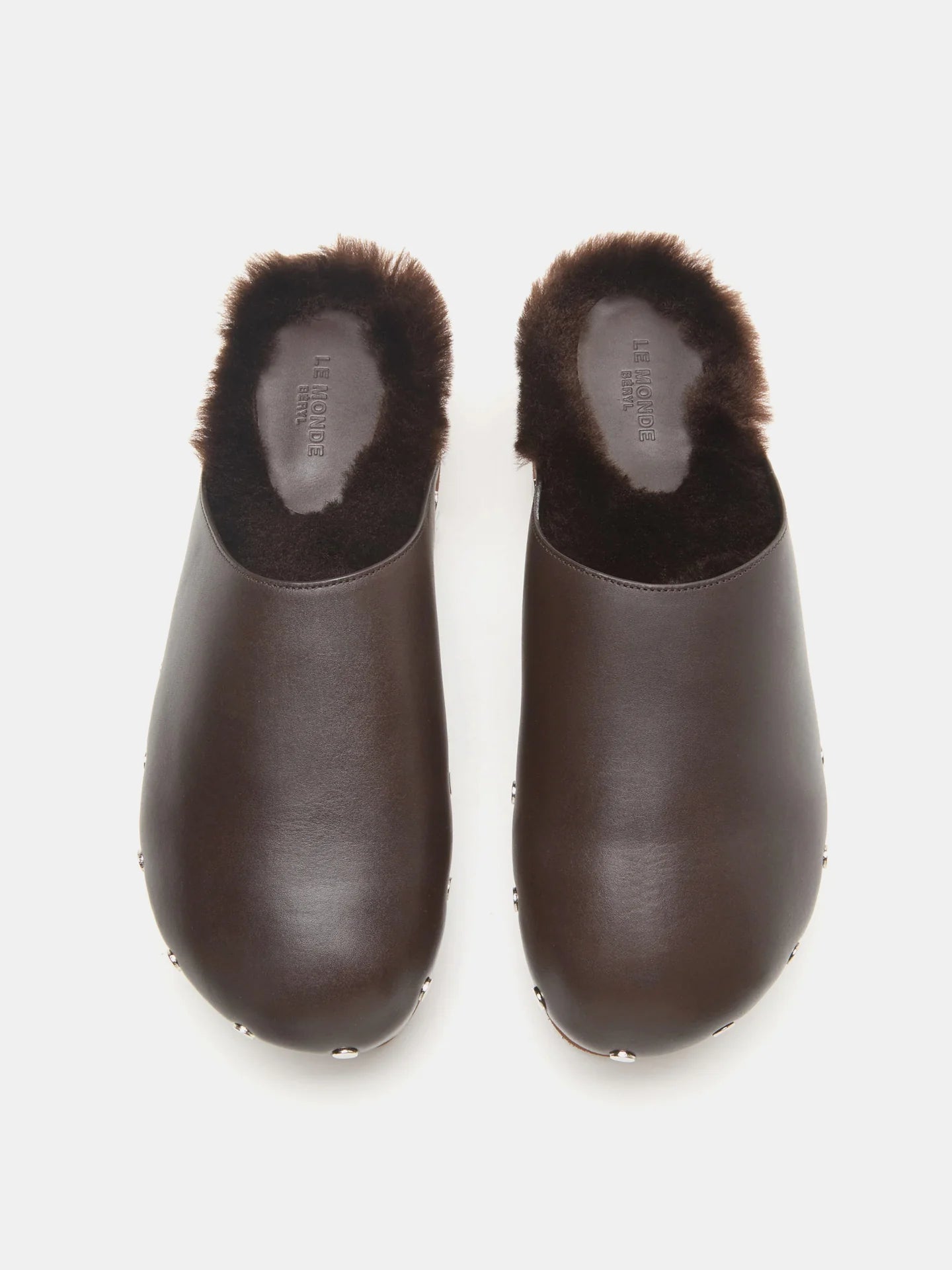 Stylish Mink Brown Clog by Le Monde Béryl with chocolate leather exterior and slip-on design, showcasing its unique craftsmanship.