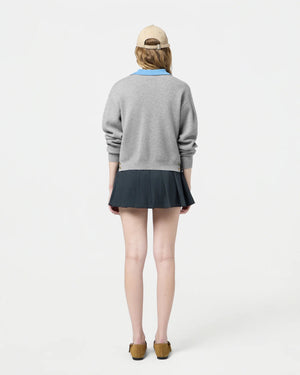 Back view of the Collegiate Cardigan in Heather Grey highlighting the signature branding at center back.