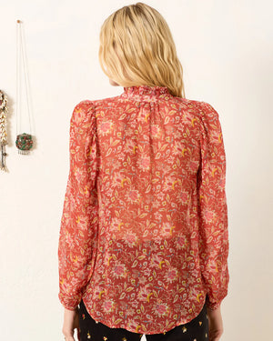 Back view of the Annabel Shirt in Sunset Ember highlighting the puff shoulders and elegant silhouette