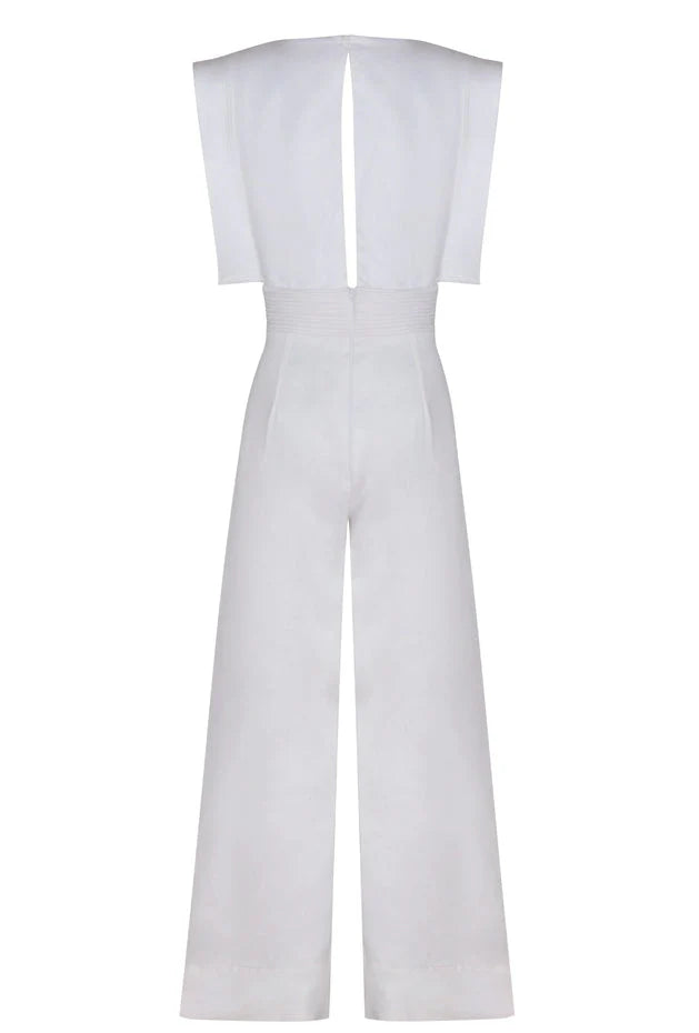 Model wearing Lienzo Abierto jumpsuit in Off White by Andres Otalora, highlighting its chic and comfortable fit.