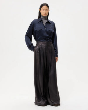 Close-up of the Avery Leather Pant in Dark Midnight highlighting the luxurious texture and detailing.