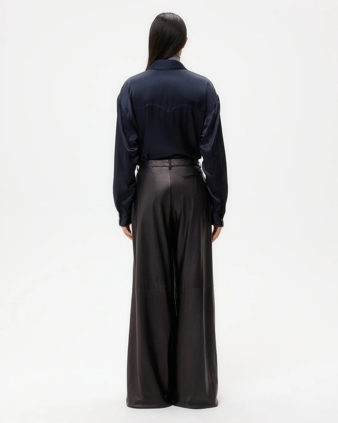 Back view of the Avery Leather Pant in Dark Midnight showing the welt pockets and belt loops.