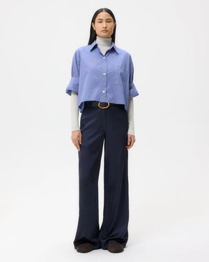 Stylish white and navy cropped button-down shirt from TWP's Next Ex collection.