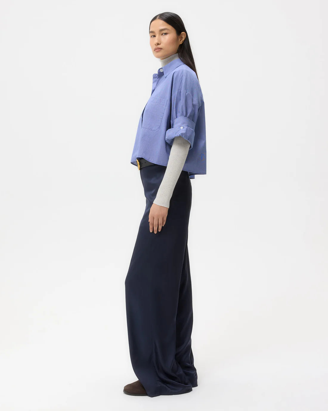 Close-up of TWP's Next Ex in White/Navy, showcasing the chest patch pocket and button placket.