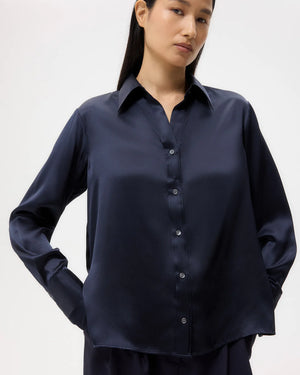 Model wearing the Joey Shirt in Midnight, illustrating its classic fit and stylish spread collar.