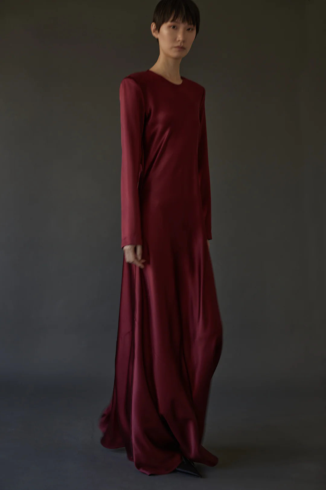 Ruth Dress in Burgundy, showcasing the sleek bias cut and elegant long sleeves, designed by Heirlome.