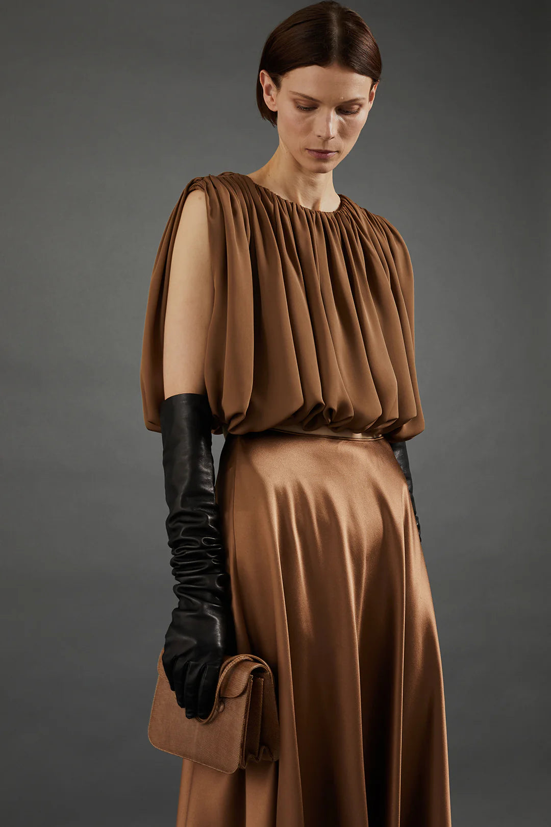Lifestyle shot of the Heirlome Penelope Top in Sepia being worn at an outdoor event.