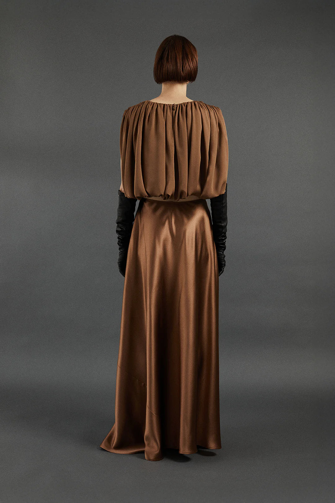 Back view of Antonia Skirt in Sepia flaunting its graceful sweep.