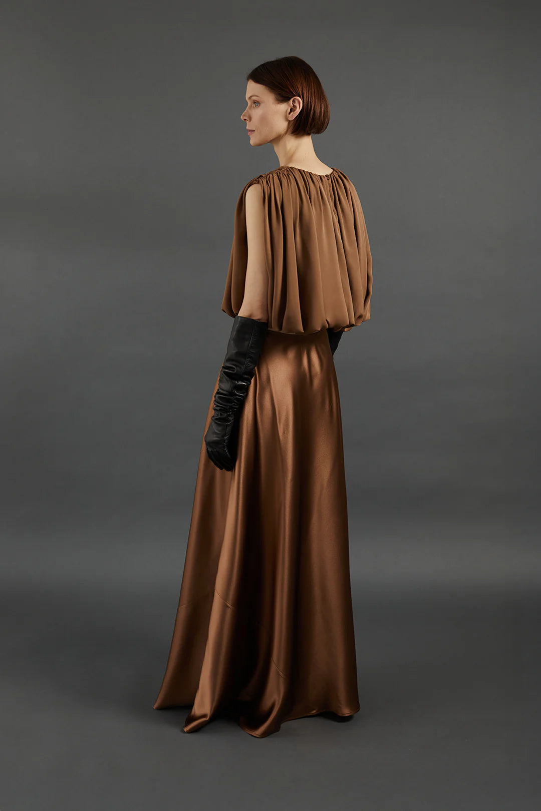 Back view of the Heirlome Penelope Top in Sepia highlighting the shirred hemline.