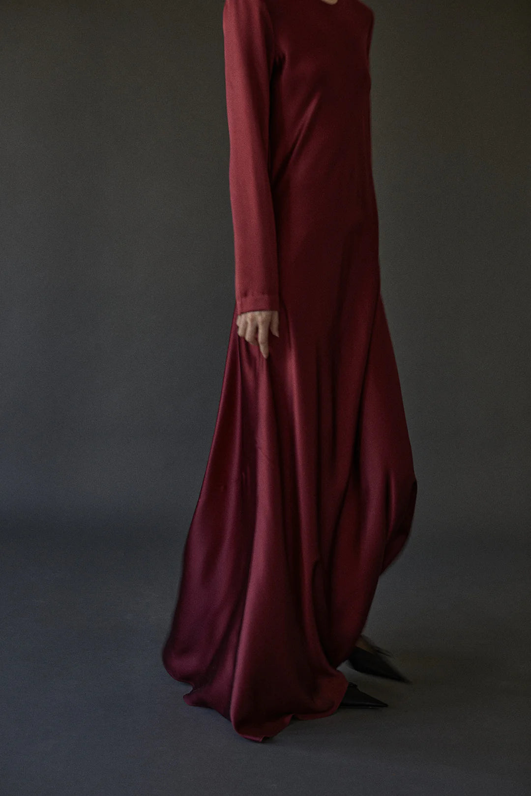 Fashionable Ruth Dress in Burgundy, demonstrating the effortless elegance of Heirlome's design, ideal for evening wear.