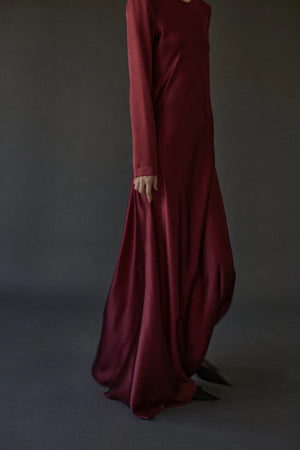 Fashionable Ruth Dress in Burgundy, demonstrating the effortless elegance of Heirlome's design, ideal for evening wear.