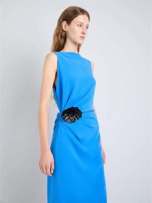 Back view of the Indria Dress in New Blue by Proenza Schouler, featuring elegant construction and sculptural details.