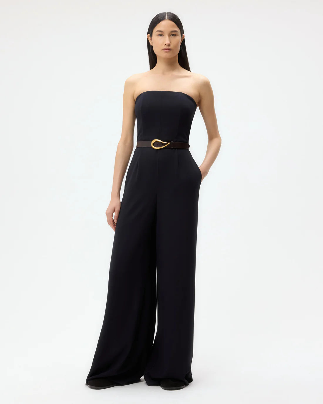 Close-up of the fitted bust detail of the Jade Jumpsuit in Midnight, showcasing the elegant drapey wool crepe fabric.