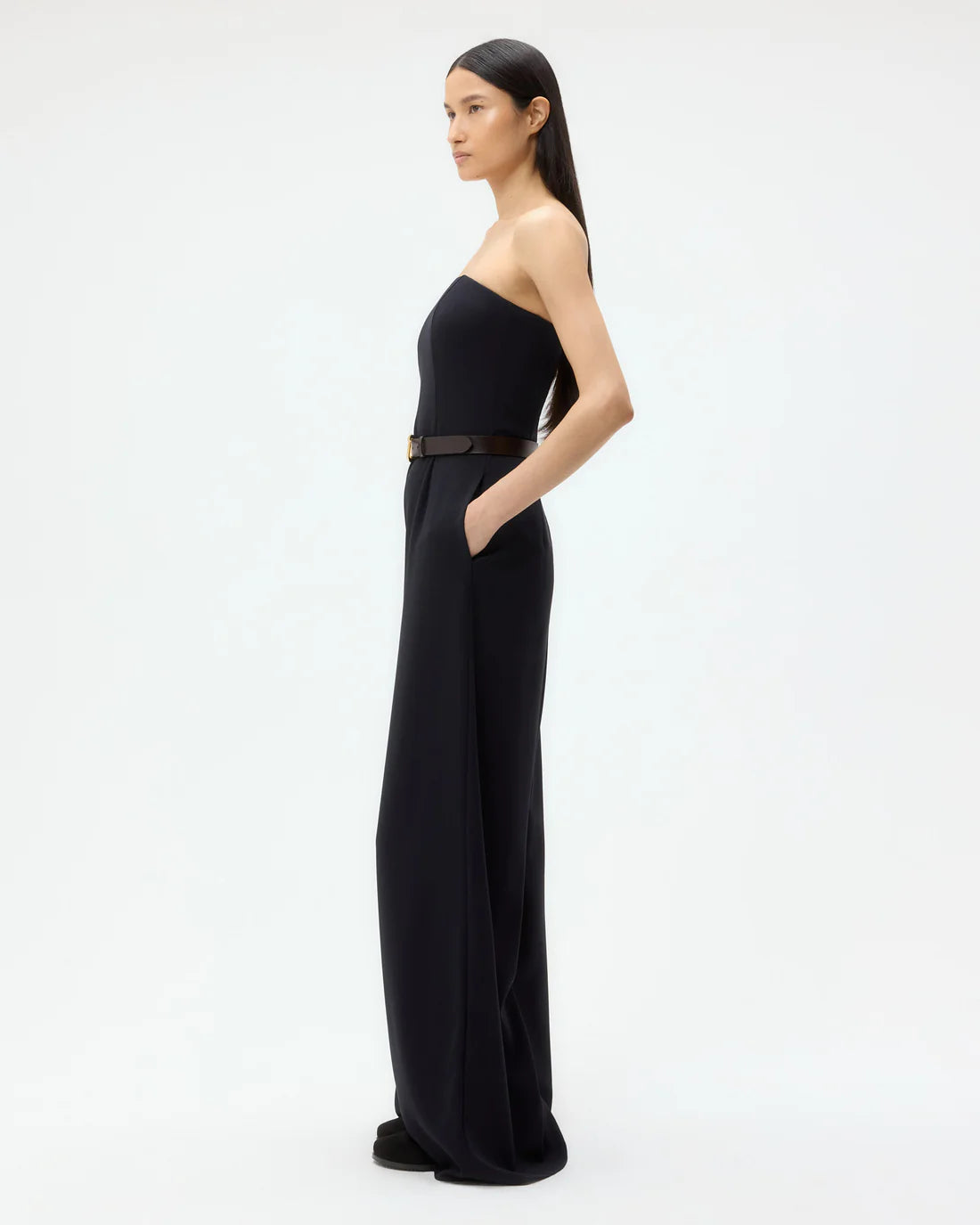 Back view of the Jade Jumpsuit in Midnight with concealed zip, demonstrating its relaxed wide-leg style ideal for any occasion.