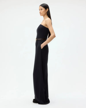 Back view of the Jade Jumpsuit in Midnight with concealed zip, demonstrating its relaxed wide-leg style ideal for any occasion.