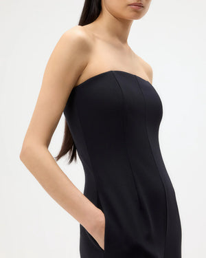 Detailed view of the fabric texture of the Jade Jumpsuit in Midnight, emphasizing its 100% wool composition and softness.