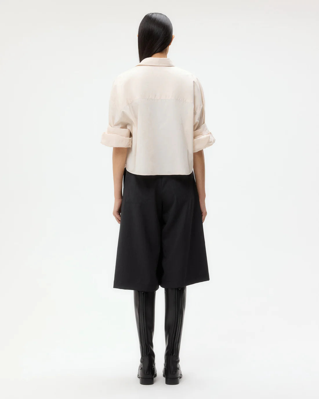 Back view of the Next Ex Shirt in Pink Tint, illustrating the cropped cut and stylish fit.