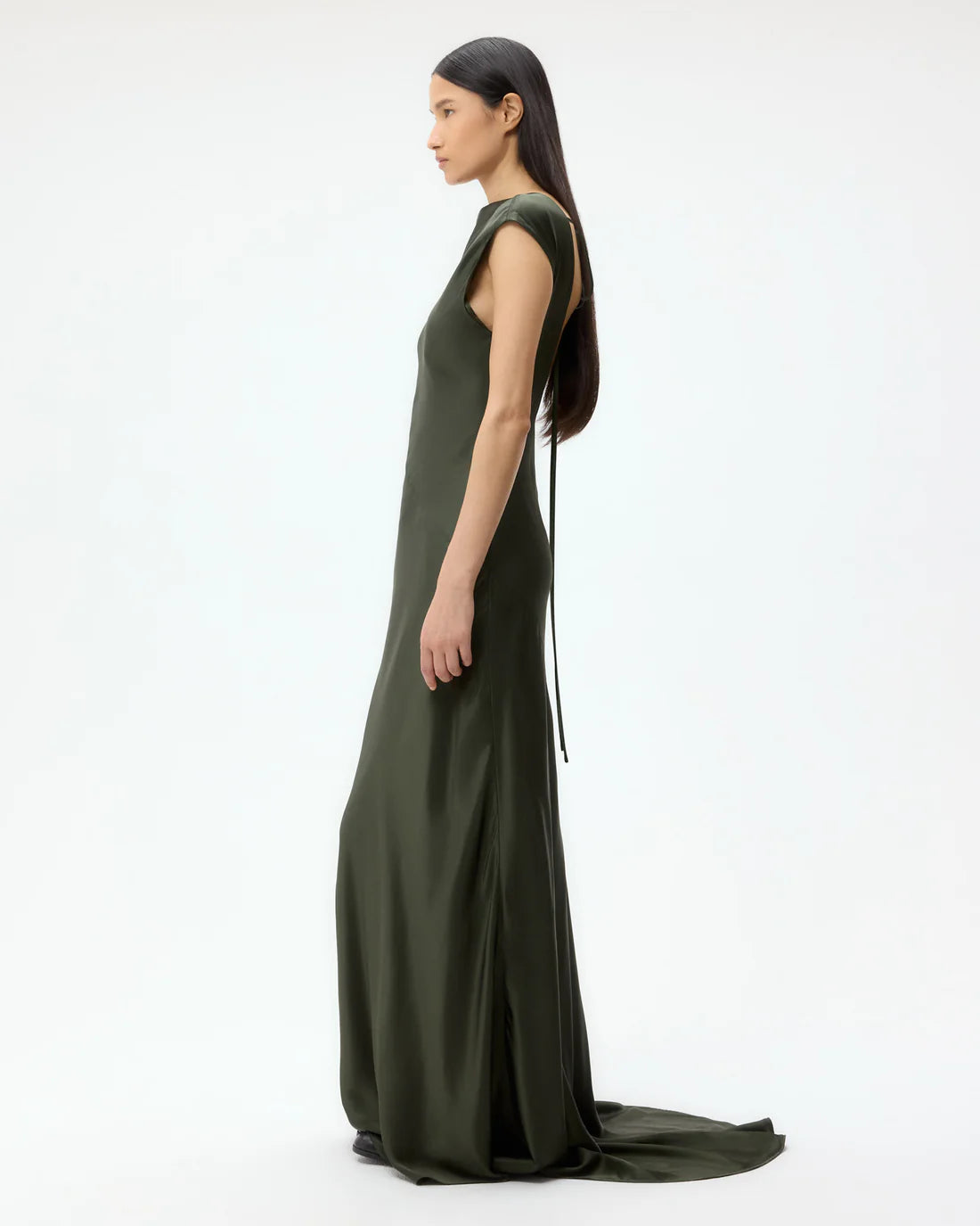 Back to You Dress in Duffle Bag featuring the stylish hanging straps and elegant train.