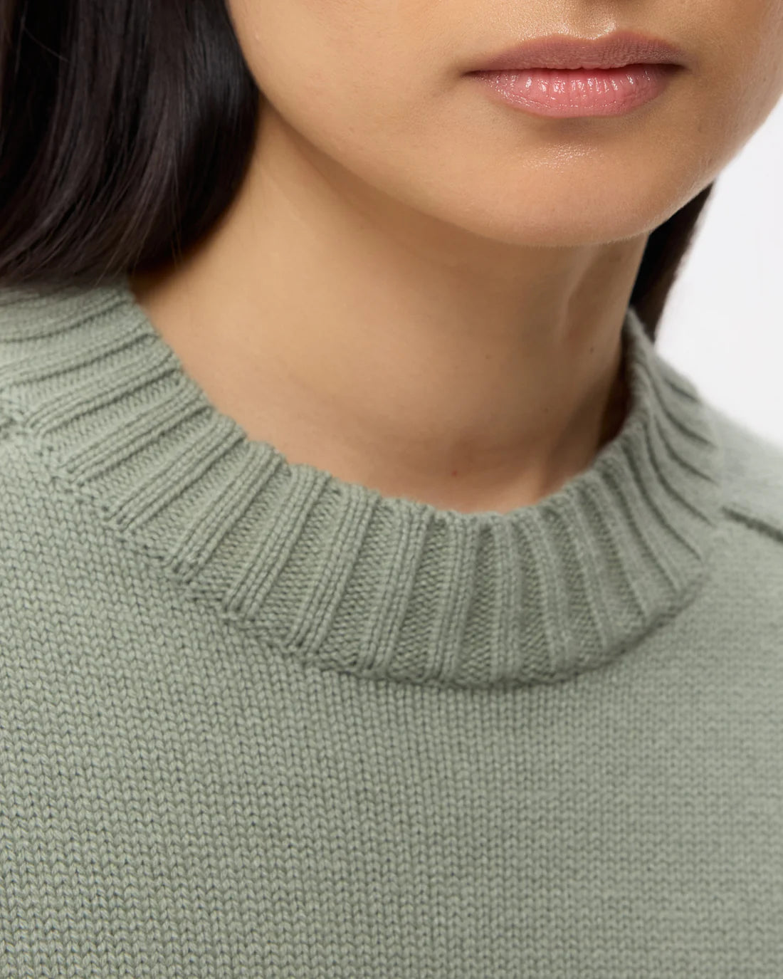 New Jill Crewneck in Martini Olive - A stylish view of the crewneck sweater worn, emphasizing its chic design and color.