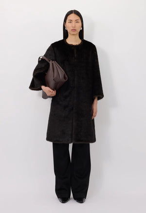 Moore Faux Fur Coat in Grizzly, highlighting the hidden button placket and stylish 3/4 sleeves.