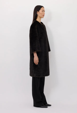 Close-up of Moore Faux Fur Coat in Grizzly from Loulou de Saison, featuring soft faux fur texture.