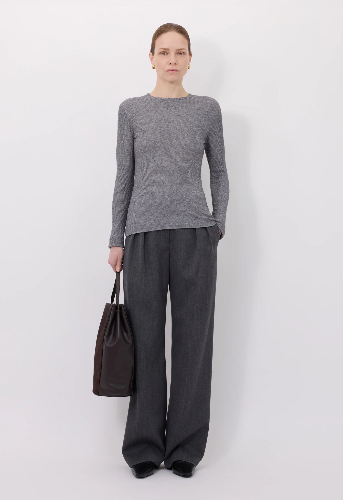Close-up of the soft ribbed texture of Ortigia LDS Ribbed Long Sleeve T-shirt in Grey by Loulou de Saison, highlighting its high-quality fabric.
