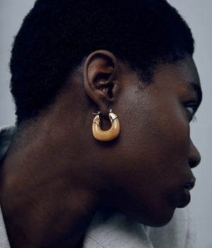 Model wearing Mini Organic Hoops in Mocha by Lizzie Fortunato, highlighting their versatile style and perfect drop length.