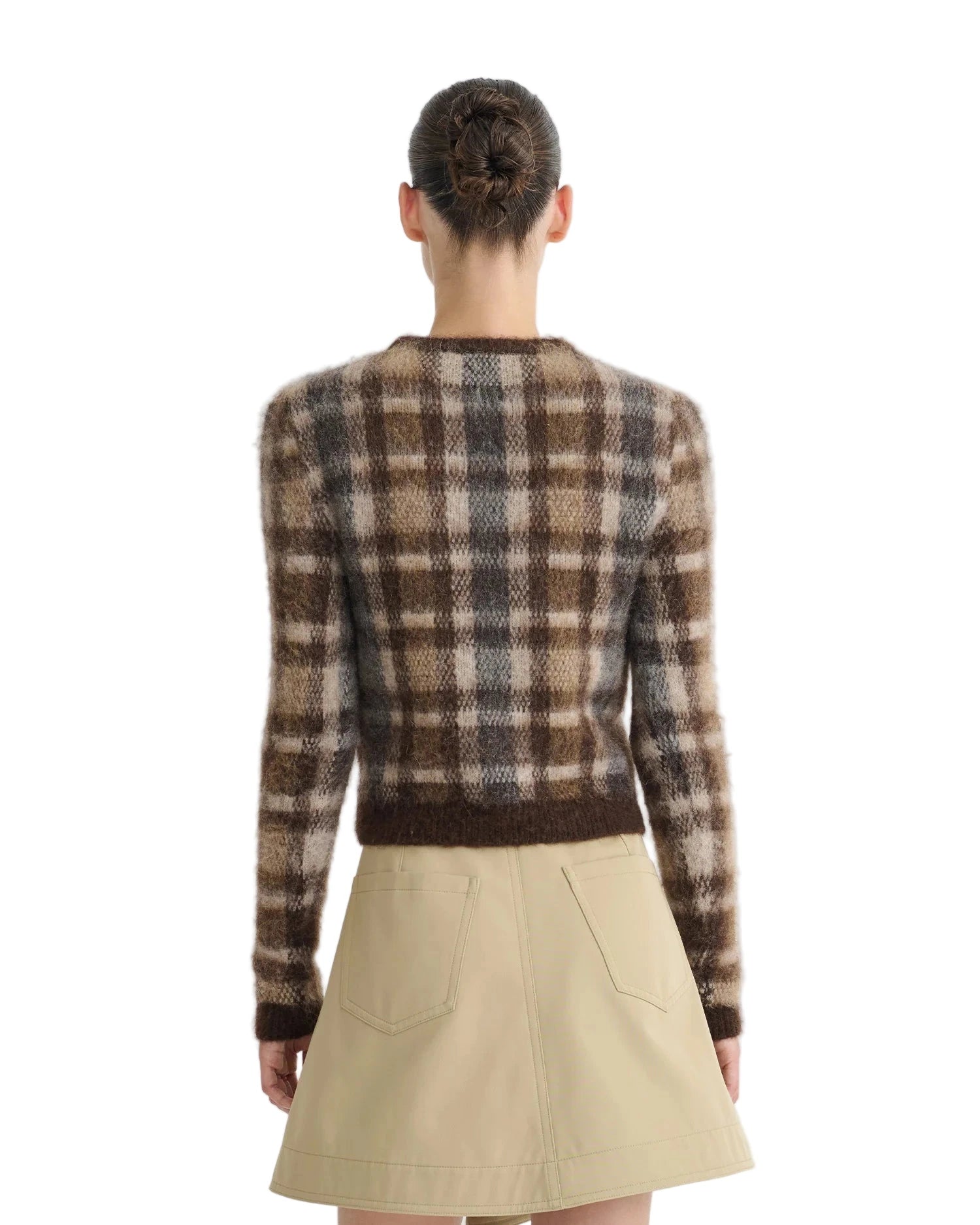 Model wearing the Farica Sweater in Brown/Creme Check by Nanushka, demonstrating elevated everyday luxury.