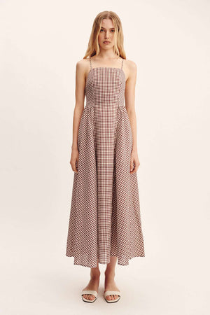 Detailed view of Callie Dress in Petite Mocha Gingham showcasing its hand-loomed cotton fabric.