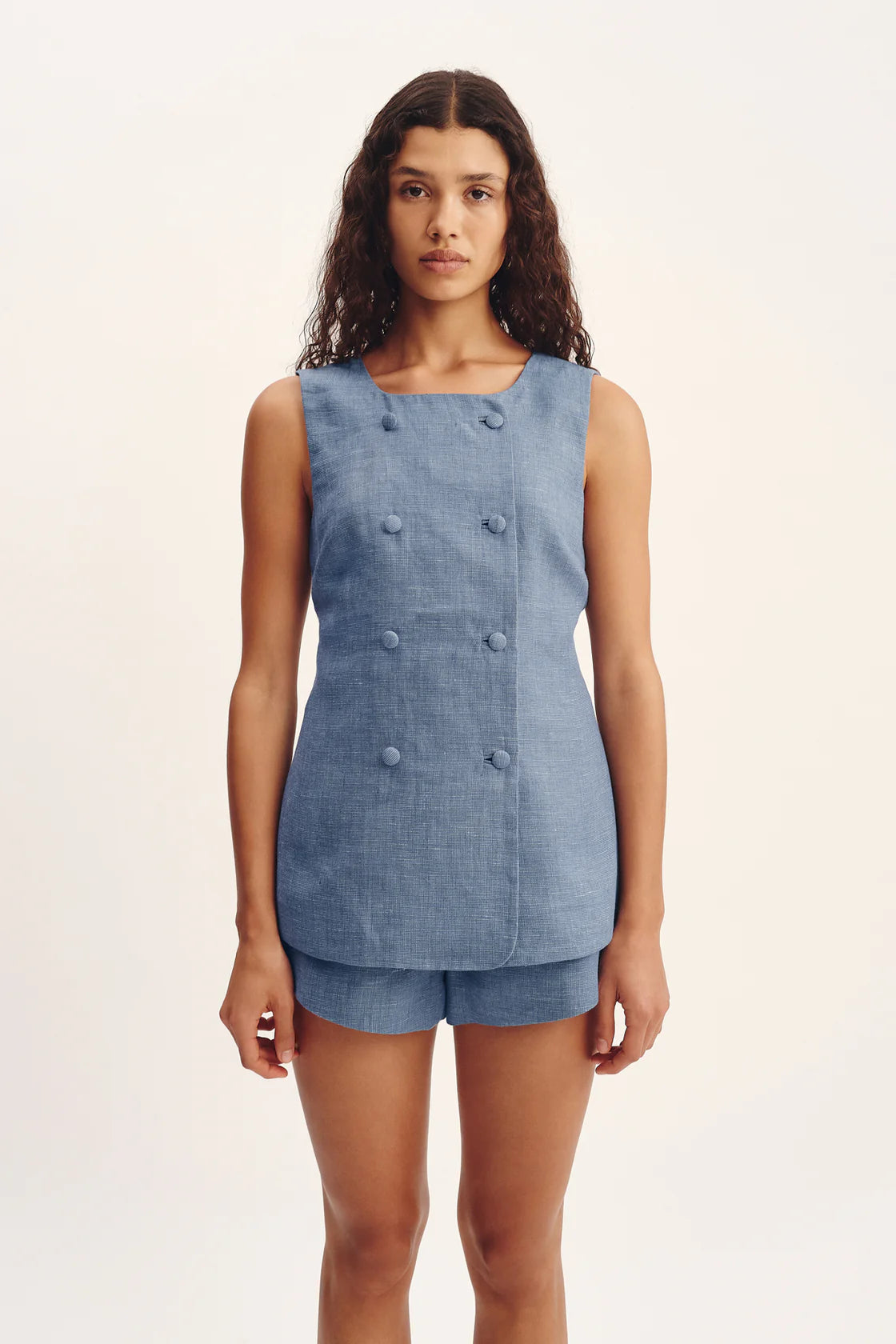 Close-up of Thea Vest in Steel Blue from Posse highlighting the premium linen texture and adjustable buckle fastening.