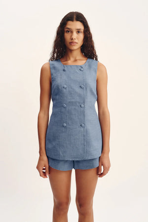 Close-up of Thea Vest in Steel Blue from Posse highlighting the premium linen texture and adjustable buckle fastening.