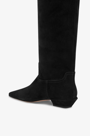 Side view of Bettina Boot in Black Suede, showcasing its sleek silhouette and comfortable heel height.