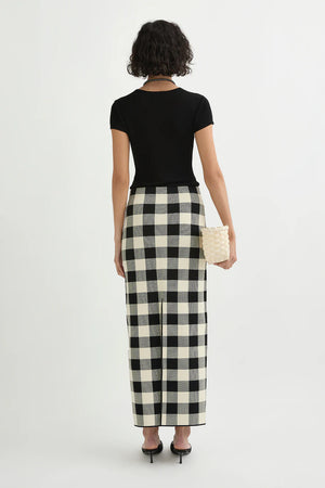 Back view of the Pippa Skirt in Heritage Plaid featuring a back center split for ease of movement.
